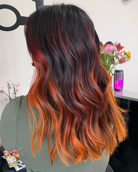 Halloween Balayage, Orange Ends Hair, Black And Copper Balayage, Black Hair Orange Money Piece, Orange Money Piece Hair Brunette, Sunset Hair Underneath, Dark Brown Hair With Orange Money Piece, Brown Hair With Orange Money Piece, Orange Ends Of Hair