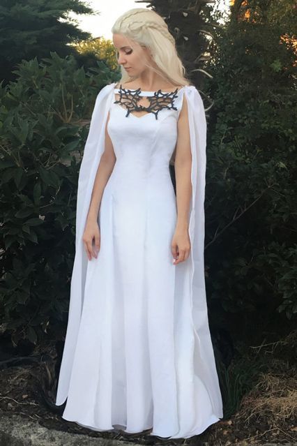 The Best Khaleesi Costumes We’ve Ever Seen  #refinery29  http://www.refinery29.com/2016/09/122141/khaleesi-halloween-costumes-daenerys-targaryen#slide-27  This all-white Daenerys getup is downright ethereal. ... Khaleesi Halloween Costume, Khaleesi Costume, Game Of Thrones Halloween, Daenerys Targaryen Costume, Game Of Thrones Dress, Medieval Wedding Dress, Got Costumes, Game Of Thrones Costumes, Medieval Wedding