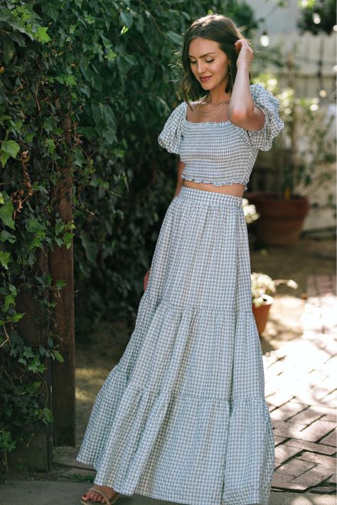 Summer fashion is all about looking cute while staying cool. The perfect way to do that is with a maxi skirt! Today Honest Darling is sharing her favorite maxi skirt and matching top you need in your wardrobe this summer. This Gingham print look is the perfect casual outfit for your style. Follow for more style guides, elevated outfit ideas, and summer fashion trends. Cute Matching Sets, Sets For Summer, Cottage Core Dresses, Summer Wardrobe Staples, Gingham Skirt, Cute Matching, Puff Sleeve Crop Top, Tiered Maxi Skirt, Bridal Shower Dress