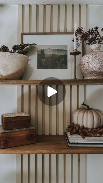 Ashleigh Deforest | DIY on Instagram: "Have a blank wall you have no clue to do with? Add a Simple Slat Accent Wall with floating shelves 😍" Wood Slat Bookshelf Wall, Horizontal Wood Slat Wall With Shelves, Wood Slat Accent Wall With Shelves, Slatwall Bookshelf, Diy Slat Wall Bookshelf, Slat Wall, Blank Walls, Floating Shelves, Accent Wall