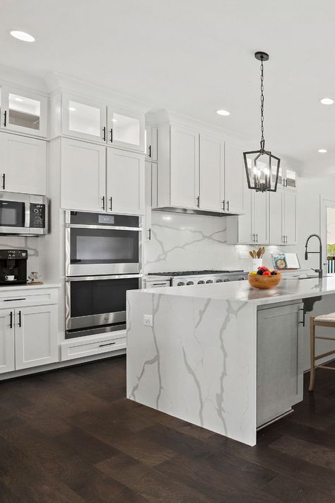 The quartz waterfall island is stunning! The natural veining on the material makes this a one-of-a-kind piece that pulls the room together. Quartz Waterfall Island, Waterfall Island Kitchen, Waterfall Island, Kitchen Remodel Design, Quartz Kitchen, Island Kitchen, Kitchen Upgrades, Kitchen Reno, The Room