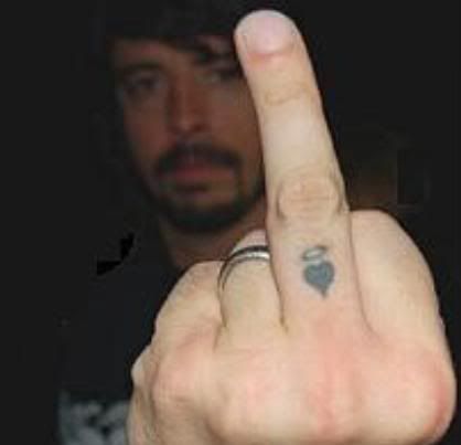 Halo over heart, left hand, middle finger. I am in love. Dave Grohl Finger Tattoo, Nirvana Tattoo Ideas, Dave Grohl Tattoo, Foo Fighters Tattoo, Rockstar Tattoo, Nirvana Tattoo, Halo Tattoo, Fighter Tattoo, Middle Finger Tattoos