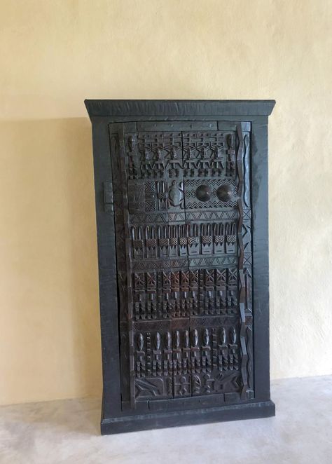 African cabinet made from panga panga wood with a Dogon Door front. African Home Decor Ideas, African Furniture Design, Dogon Door, African Doors, Dogon Tribe, Natural Edge Wood, Native African, Luxury African Safari, African Furniture