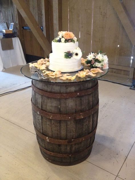 Ceremonial Cake on Wine Barrel with Glass Top at Camarillo Ranch Barn #wedding #weddingday #weddingideas #rusticwedding #rustic #wildflowers #roses #rosepetals #winebarrel #weddingcake #cake #weddingrental #weddingdecor #beautiful #gorgeous #camarilloranch Whiskey Barrel Dessert Table, Whiskey Barrel Wedding Cake Table, Wine Barrels Wedding, Barrel Dessert Table, Wine Barrel Cake Table, Barrels Wedding, Wedding Cake On Wine Barrel, Cake On Whiskey Barrel, Keg Table