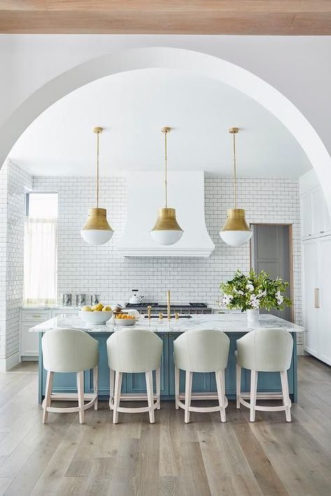 White and gold kitchens are all the rage these days. With their lux brass finishes and chic white cabinets, it's no wonder this design scheme has taken off. Today on the blog we're going over the BEST design ideas for white and gold kitchens. Take your design to the next level today! Gold Pendant Lights Over Kitchen Island, Gold Pendant Lights, Classic Farmhouse Kitchen, Rustic Home Interiors, Farmhouse Kitchen Island, Kitchen Island With Seating, Rustic Kitchen Design, All White Kitchen, Classic Kitchen