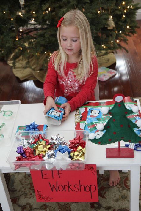 Create an Elf Workshop Wrapping Station - Toddler Approved Elf Workshop, Christmas Cubicle Decorations, Christmas Activities For Toddlers, Sensory Items, Gift Wrapping Station, Wrapping Station, Gingerbread People, Dramatic Play Preschool, Elf Activities