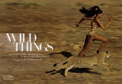 Naomi Campbell voor de shoot Wild Things. Ze wordt als een typisch Afrikaanse stamvrouw vastgelegd. Jean Paul Goude, Poster Grafico, Mert And Marcus, Nan Goldin, Knysna, Patrick Demarchelier, Ellen Von Unwerth, Terry Richardson, Cecil Beaton