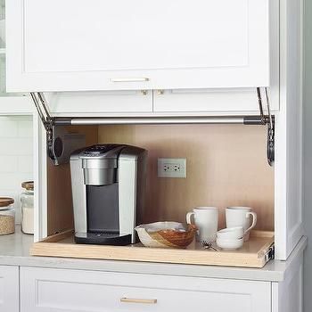 Kitchen Cabinet With Garage Style Door Design Ideas Coffee Hidden Cabinet, Pull Up Kitchen Cabinet Doors, Coffee Cabinet Ideas, Hidden Coffee Station, Appliances Cabinet, Kitchen Terracotta, Light Grey Kitchen Cabinets, Herringbone Tile Backsplash, Coffee Station Kitchen