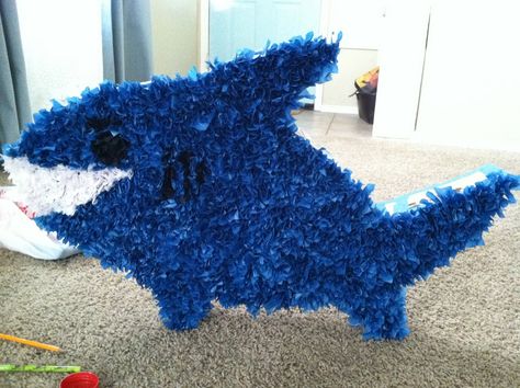 Plus, how to make any shape pinata you want! My husband and I have been prepping for our son's 7th birthday party, and I put him in charge... Diy Fish Pinata, Diy Shark Pinata, Under The Sea Pinata Diy, Crab Pinata, Beach Theme Pinata, Fish Pinata, Shark Birthday Party, Shark Party, Blue Fish