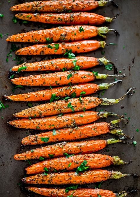 Garlic and Herb Roasted Carrots - these carrots are roasted to perfection with lots of garlic and herbs such as thyme, basil and oregano, creating the perfect side dish. www.jocooks.com #roastedcarrots Herb Roasted Carrots, Carrots In Oven, Carrot Recipes Side Dishes, Oven Roasted Carrots, Grilled Carrots, Roasted Carrots Recipe, Carrots Recipe, Carrot Recipes, Veggie Side Dishes