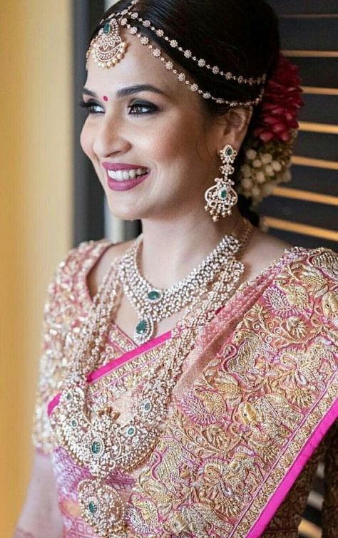 These gorgeous south Indian brides ditched the bling of gold & opted for the sparkle of diamonds on their big day! When it comes to bridal jewellery, more & more brides are choosing to create their own personal look versus following the traditional route of their parents’. With more options available to today’s brides, custom jewelry & diamond jewelry such as chokers, harams & necklaces are increasingly popular & affordable. Let’s take a look at how these brides are slaying their diamond looks. Soundarya Rajinikanth Wedding, Birthday Outfit For School, Bride Pic, Diamond Haram, South Indian Bridal Jewellery, Anirudh Ravichander, Bridal Sarees South Indian, Outfit For School, Embroidered Sarees