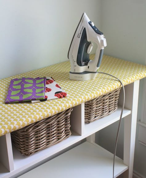 This clever IKEA hack turns the top of a long table into an ironing space, and offers spots for baskets underneath. Ikea Side Table, Ironing Station, Sewing Room Organization, Quilting Room, My Sewing Room, Sewing Rooms, Ironing Board, Laundry Room Organization, Craft Room Organization