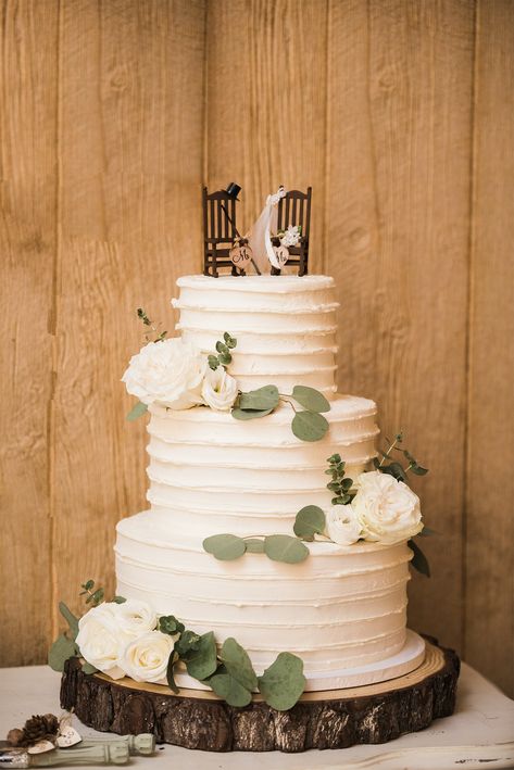 Rustic Three Tier Wedding Cake, Wedding Cake On Wooden Stand, Simple Rustic Wedding Cake 3 Tier, Country Chic Wedding Cake, Rough Iced Wedding Cake, Rustic Sage Green Wedding Cake, Wooden Cake Stand Wedding, 3 Tier Wedding Cake Rustic, Southern Wedding Cake