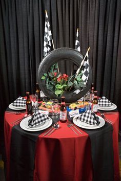 NASCAR Themed Race Centerpiece with Tire and Checker Flags Two Fast Two Furious, Car Centerpieces, Nascar Party, 50th Birthday Party Themes, Biker Party, Race Car Themes, Car Themed Parties, Race Car Birthday Party, Race Party