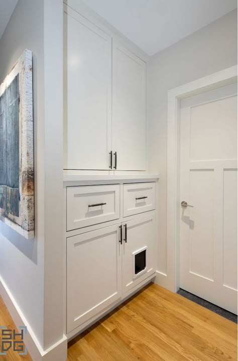 Storage built for the whole family, including your cat! Spot the cat door for a hidden litter box. #SlocumHallDesign #Storage #StorageSolutions #Cat #CatDoor #CreativeSolutions #InteriorDesign #Architecture #Boston #BostonDesign #BostonHomes #BostonArchitecture Hidden Litter Robot, Litter Box Built In Cabinet, Laundry Room Ideas With Cat Litter, Cat Built In, Cat Litter Ideas Hidden, Cat Litter Robot Ideas Hidden, Built In Kitty Litter Cabinet, Built In Cat Litter Box Ideas, Cat Litter Box Ideas Hidden Cabinet