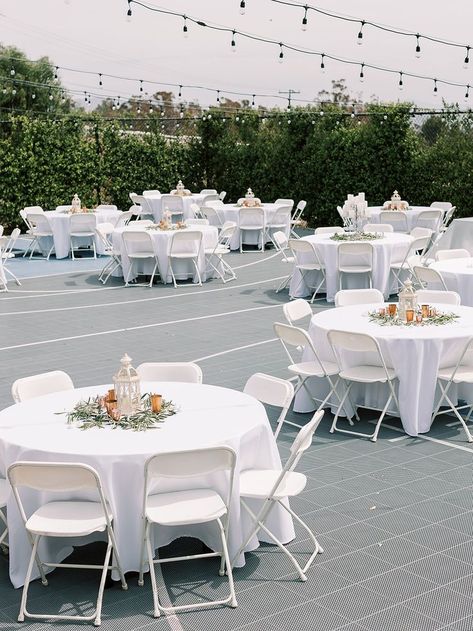 Lantern Centerpieces Wedding, Tennis Court Wedding, Wedding Reception Checklist, Backyard Event, Round Table Centerpieces, Wedding Dinner Decor, Outdoor Wedding Tables, Wedding Table Setup, Lantern Centerpiece Wedding