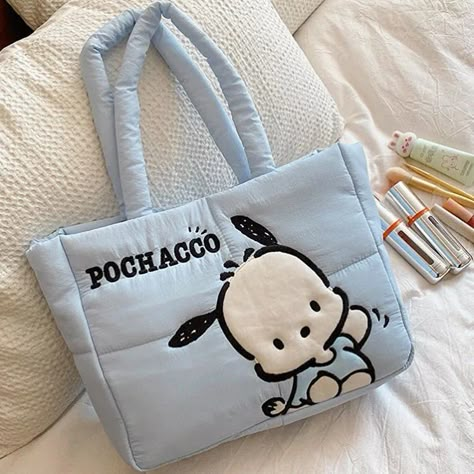 Sanrio Puffer Tote Bag available for preorder. $300TTD Puffer tote is filled with cozy down, and its double lining adds extra protection for your belongings. *This is a pre order Item and the estimated arrival is 2.5-3 weeks from the date we place the order for the item. Pre order items require a 75% down payment. Deadline: June 15th Genuine Product Dimensions : 34cm x 23cm x 11cm Can fit laptops, iPad, books & other essentials •To order one, visit our website or send us your name, con... Sanrio Embroidery, Embroidery Characters, Sanrio Characters Kuromi, Sanrio Bag, Sanrio Accessories, Eco Materials, Fabric Tote Bag, Charmmy Kitty, Fabric Tote Bags