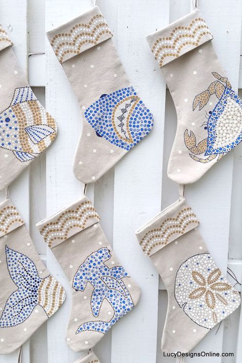 Coastal Christmas Stockings - WomansDay.com Coastal Christmas Stockings, Cute Christmas Stockings, Decorated Stockings, Florida Christmas, Coastal Christmas Decor, Beachy Christmas, Christmas Stockings Diy, Nautical Christmas, Tropical Christmas