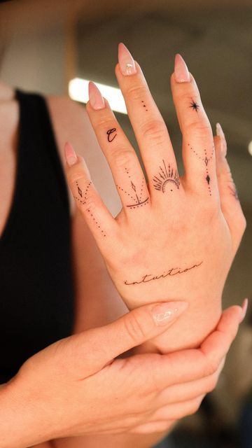 Monica Ragheb - Toronto Fineline Tattoo Artist on Instagram: "Lovely ornamental hand tattoos for Emily! I love creating hand tattoos like this. They’re very dainty and delicate tattoos that elevate your look. Imagine these fine line tattoos under rings! So beautiful! #handtattoo #fingertattoo #finelinetattoo #scripttattoo" Hidden Hand Tattoo, Hand Ornaments Tattoo, Single Line Hand Tattoo, Dainty Wedding Ring Tattoo, Fine Hand Tattoos, Ring Finger Tattoos For Women, Line Work Hand Tattoo, Finger Line Tattoo, Hand Script Tattoo