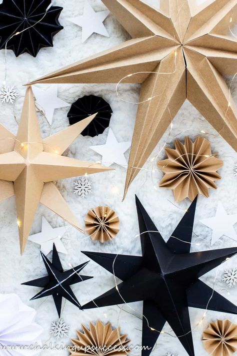 Today, I'm sharing how to make 3D paper stars in an easy, step-by-step tutorial. Learn how to make 8 pointed, 3D paper star decorations for your house or to use as gift hangers. Three-dimensional paper stars are simple to make and look amazing grouped together in different sizes. Add some string for hanging your paper star or simply place them on a shelf amongst your other Christmas ornaments. Diy 8 Point Paper Star, Paper Stars With Lights, Origami Stars Christmas, 3 D Stars From Paper, Danish Christmas Stars, Diy Star Paper Lantern, Paper Star For Christmas Tree Topper, Hanging Paper Stars Diy, Diy Star Hanging Decorations