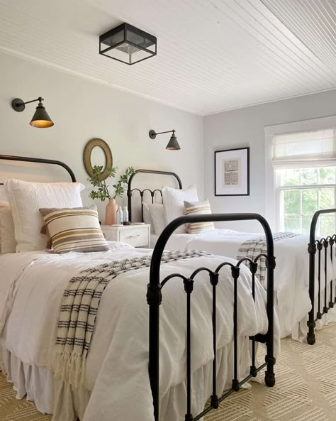 22 Matching Twin Bedroom Ideas That Work for Small Rooms Modern Farmhouse Guest Bedroom With Twin Beds, White Twin Beds Guest Room, Twin Metal Bed Frame Bedroom Ideas, Twin Beds Guest Room Farmhouse, Twin Guest Bedroom, Simple Bedroom Ideas For Small Rooms, Twin Bedding Sets, Bedroom Inspirations For Small Rooms, Twin Beds Guest Room