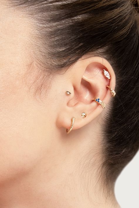 Cartilage conch and helix piercing with gemstones in 14k solid gold Piercing Ideas Conch, Ear Piercing Ideas Conch, Hoop Conch Piercing, Outer Conch, Cartilage Piercing Hoop, Cartilage Helix Piercing, Types Of Ear Piercings, Piercings Cartilage, Ear Piercing Ideas