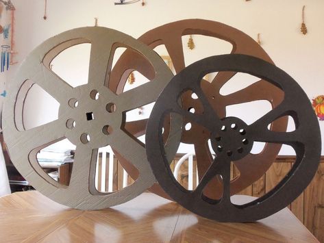 Lights, camera, action! Make your at-home theater room feel more like the real deal with this movie reel made from items around the house. Movie Reel Decor, Deco Cinema, Oscars Party Ideas, Cinema Party, Hollywood Birthday, Hollywood Night, Hollywood Party Theme, Movie Reels, Movie Themed Party