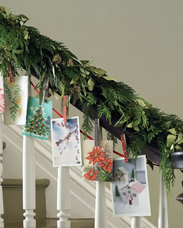 DIY Christmas Tree Garland Ideas to Personalize Your Holiday | Sorry tinsel, your time is over. These festive embellishments are the perfect garland to adorn your Christmas tree. Gather all of the cards from your friends and family, near and far, and hang them on a clothesline for a garland with real sentiment.  #christmas #crafts #marthastewart #DIYdecor Holiday Card Display, Christmas Stairs Decorations, Christmas Stairs, Christmas Card Display, Christmas Staircase, Easy Holidays Crafts, Holiday Organization, Garland Ideas, 12 December