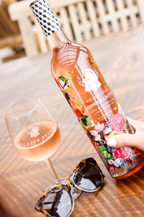 Bright blooms take over the bottom of this bottle, which would make an ideal vase once empty.   - Delish.com Pretty Wine Bottles, Wine Pics, Summer In A Bottle, Bottles Packaging, Wine Bottle Design, Rosé Wine, Hen Party Ideas, Wine Photography, Wine Tasting Party