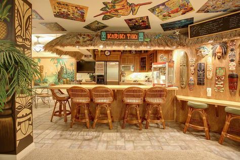 We Can't Take Our Eyes Off This Champaign House's Tiki Bar | ChambanaMoms.com Tiki House Decor, Bloxburg Tiki Bar, Tiki Bar Basement Ideas, Tropical Tiki Bar, Polynesian Bar Design, Classy Tiki Bar, Tiki Kitchen, Party Basement, Laneway Festival