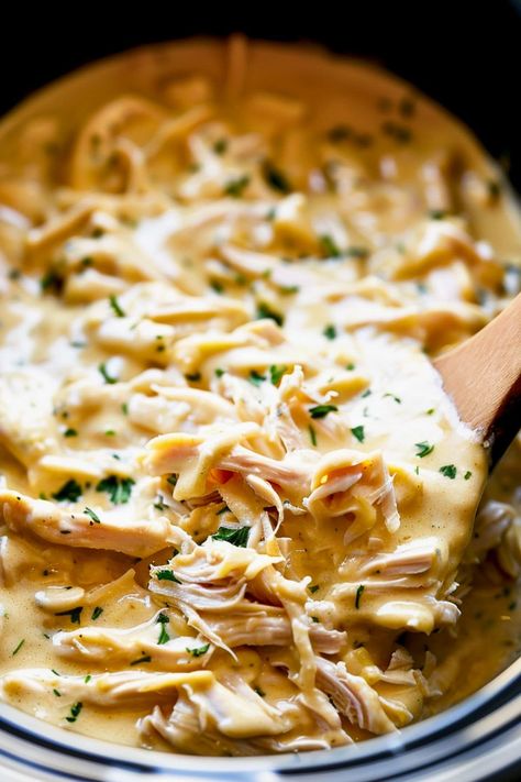 This Crockpot Italian chicken is creamy, easy, and delicious! It's made with a luscious sauce of cream cheese, cream of chicken soup, and Italian dressing. Cream Cheese Italian Chicken Crock Pot, Slow Cooker Creamy Italian Chicken, Crock Pot Chicken Recipes Italian, Chicken With Zesty Italian Dressing, Recipes With Italian Dressing Packet, Creamed Chicken Crockpot, Crockpot Chicken Sour Cream Recipes, Crockpot Creamy Chicken Recipes, Cream Of Chicken Recipes Crockpot