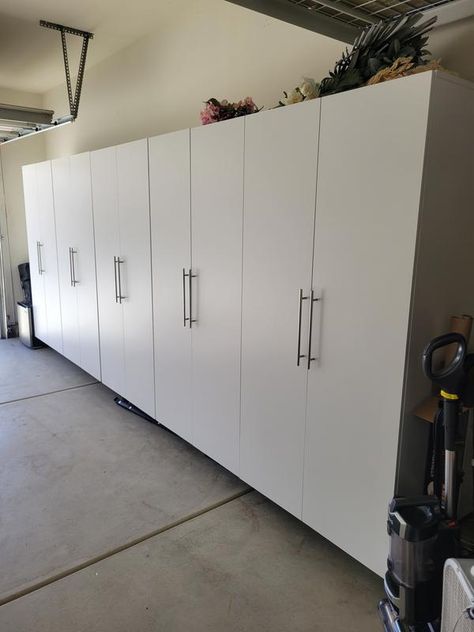 Affordable Garage Storage, Wall Of Storage Cabinets, Storage Room Cabinets, Garage Cabinet Storage, No Garage Solutions, Garage Storage Cabinets With Doors, White Garage Interior, Basement Wardrobe Storage, Laundry Room Tall Storage Cabinet