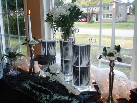 X-Ray Nursing Graduation Centerpieces. So simple and elegant! I love it! Large Glass Vases, Radiology Schools, Nurse Grad Parties, Rad Tech Week, Nursing School Graduation Party, X Ray Tech, Nurse Party, Radiology Tech, Pinning Ceremony