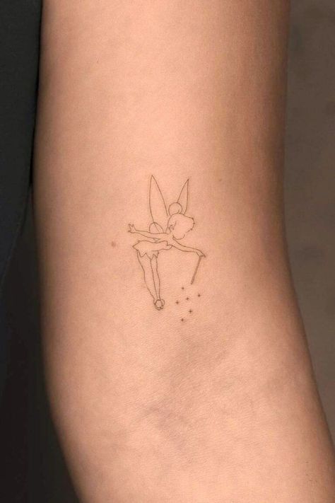 28 Hottest Tinker Bell Tattoo Ideas and Designs #tattoo #art #outline #template #portfolio #idea #neck #minimalist #inspiration Tinker Bell Outline Tattoo, Evangeline Princess And The Frog Tattoo, Tinker Bell Tattoo Design, Tiny Tinkerbell Tattoo Ideas, Minimalistic Disney Tattoo, Disney Tattoos Minimalist, Disney Outline Tattoo, Disney Tiny Tattoos, Minimal Disney Tattoo