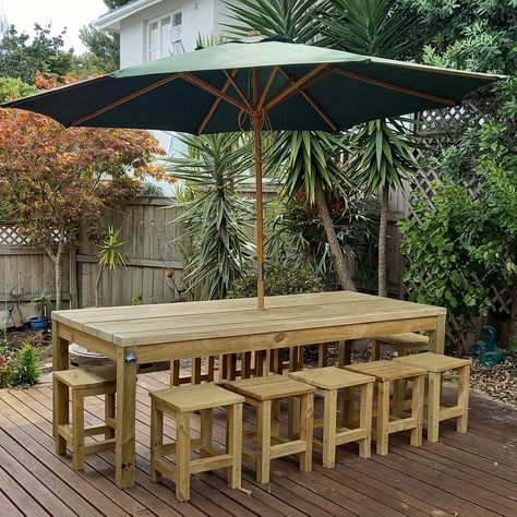 "Downloadable DIY plans with step-by-step instructions and pictures. Easily build this outdoor sturdy farmhouse table. A table capable of seating 12 people. At 8ft (2439mm) long and 39-1/2\" (1003mm) wide it is inexpensive to make and is a simple construction.  I originally made this table as part of an outdoor setting for a family occasion. At the time of writing this (some four months after the build), the table had weathered the most part of a hot summer and the tabletop boards had shrunk lea Outdoor Tables Diy, Outdoor Table For 12, Homemade Outdoor Table, Diy Outdoor Furniture Wood, Outdoor Furniture Plans Wood, Farmhouse Picnic Table Diy, Diy Table Outdoor, Diy Outdoor Table And Chairs, 2x4 Outdoor Table