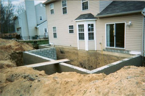 I want to do this so badly and have extra basement since our tuck under garage takes up 1/3 of this house.  It would be pantry for canned goods and tornado shelter.   As seen in picture number one, we had to create a basement which later… Basement Addition, Basement Insulation, Building A Basement, Basement Movie Room, Tornado Shelter, Stairs Makeover, Basement Windows, Small Basements, Diy Porch