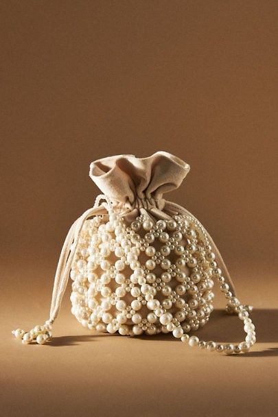 Bhldn spring 2022 Augustine bucket bag Handbag Sewing Patterns, Potli Bag, Bridal Purse, Bucket Purse, Bridal Bag, Potli Bags, Pearl Bag, Denim Diy, Beaded Bag