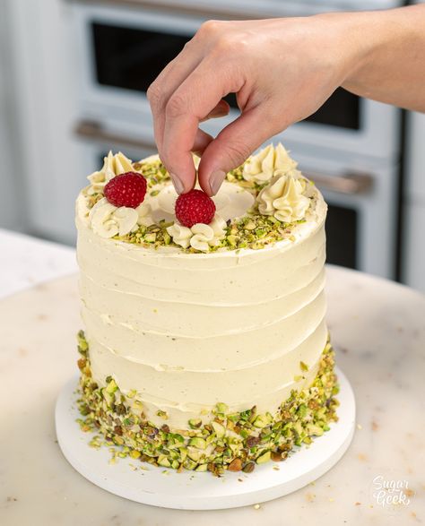 Learn how to make moist and tender pistachio cake made from scratch layered with tart raspberry filling and creamy, sweet French buttercream! This pistachio cake gets all its flavor from real homemade pistachio butter (no fake pistachio flavor here). This is a pistachio lovers dream come true! Pistachio Cake Decoration, Pistachio Cake Design, Pistachio Cake Recipe From Scratch, Cake 80th Birthday, Pistachio Raspberry Cake, Cakes 2023, 30s Birthday, Pistachio Cake Recipe, Raspberry Cake Recipes