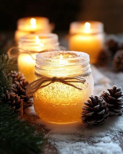 Lady rolls mason jars in Epsom salt, creates the most enchanting DIY Diy Candle Warmer, Frosted Mason Jars, Candle Ribbon, Mason Jar Candle Holders, Old Glass Bottles, Jar Candle Holder, Diy Candle Holders, Tea Candles, Mason Jar Candles