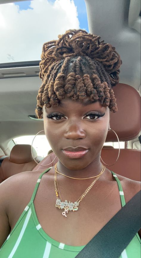 Locs styles for women: loc petals with loc knot bangs Locs Bun With Bangs, Bobby Pin Loc Styles, Locs Bangs Hairstyles For Women, Short Locs Hairstyles With Bangs, Loc Bangs Black Women, Loc Styles For Thinning Hair, Short Loc Styles With Bangs, Loc Bangs And Bun, Loc Style Inspo Black Women