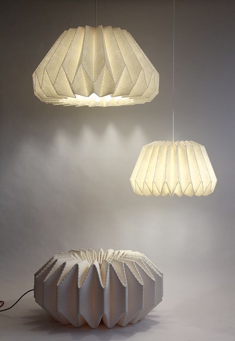 LE KLINT: Softly Pleated on Behance Origami Lighting, Printed Lampshades, Origami Lamps, Leather Lamp, Origami Lights, Lantern Party, Paper Lamps, Origami Book, Creative Lamp Shades