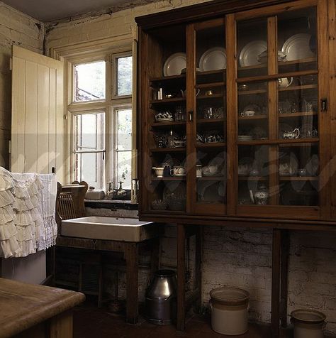 Antique Victorian glass front cupboard in Victorian style kitchen with a vintage sink Victorian Style Kitchen, Dish Cabinet, Glass Kitchen Cabinet, Victorian Kitchens, Vintage Sink, 1920s House, Glass Cabinet Doors, Glass Kitchen, Kitchen Redo