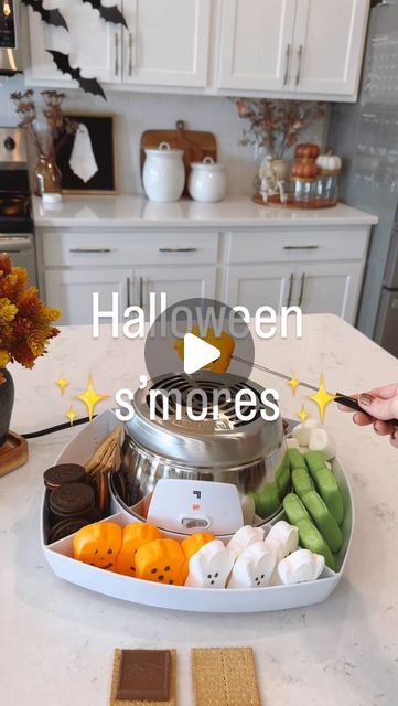 Elaina Zinke on Instagram: "Whether you want a summer Halloween treat, something fun for a scary movie night, or a girls night in, this s’more maker is ALWAYS a hit! 🖤🧡 Comment SMORE to get links to my s’more maker! 

**Also linked in my Amazon Storefront (in my bio) under “S’mores” 🖤🧡

#smores #halloweensmores #halloweendesserts #halloweentreats #halloweenmovienight #halloweentheme #halloween #amazonfinds #amazonhalloween" Smores Halloween Treats, Halloween Movie Night Treats, Halloween Smores Bar, Kids Halloween Movie Night, Smores Halloween, Halloween Movie Night Snacks, Movie Night Desserts, Halloween Smores, Smores Treats