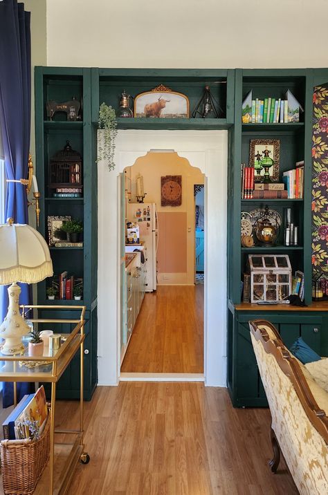 Bookshelf built over doorway. Such a cozy coffee shop feel. Built In Bookshelf Over Doorway, Around The Door Bookshelves, Books Over Doorway, Bookshelves Over Doorway, Shelving Around Doorway, Bookcases Around Doorway, Bookshelf Over Doorway, Bookshelf Around Door, Shelf Over Doorway