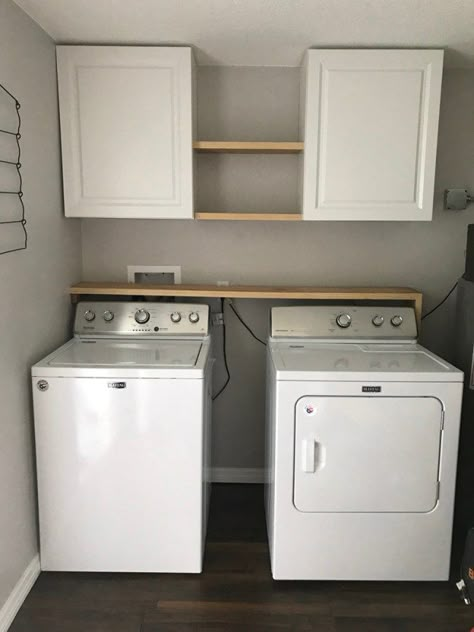 Laundry Room Storage Solutions - Add cabinets and shelving above washer and dryer for storage and organization. #laundryroom #farmhouse Laundry Room Storage Solutions, Laundy Room, Laundry Room Storage Shelves, Small Laundry Room Organization, Tiny Laundry Rooms, Room Storage Diy, Laundry Room Renovation, Farmhouse Laundry, Laundry Room Shelves