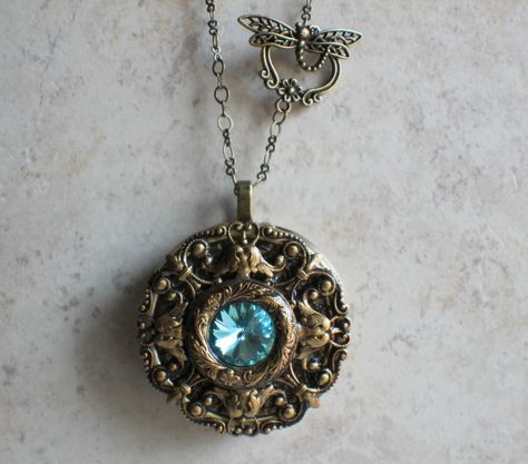 ✨ Unlock the magic of memories with our stunning Turquoise Crystal Music Box Locket! 🎶💎 This exquisite piece is not just a beautiful accessory; it’s a treasure chest for your most cherished moments. Perfect for gifting or as a special treat for yourself, let the soothing melodies and vibrant turquoise inspire your soul. 🌌💖Grab yours today for just $130.00 and carry your memories in style! #MusicBoxMagic #TurquoiseTreasures #JewelryWithMeaning #GiftOfMemories #CrystalCharm #UniqueAccessories #... Talisman Jewelry Pendants, Music Box Necklace, Music Box Locket, Box Necklace, Music Box Jewelry, Turquoise Crystal, Magical Jewelry, Rose Jewelry, Necklace Box