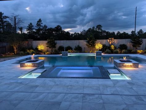 Geometric pool with fire features Pools With Fire Features, Fire Pool Feature, Pool With Fire Feature, Modern Pool With Fire Feature, Pool Fire And Water Feature, Pool Fire Feature, Rectangular Pool With Fire Pit, Modern Pool Fire Feature, Geometric Pools With Spa