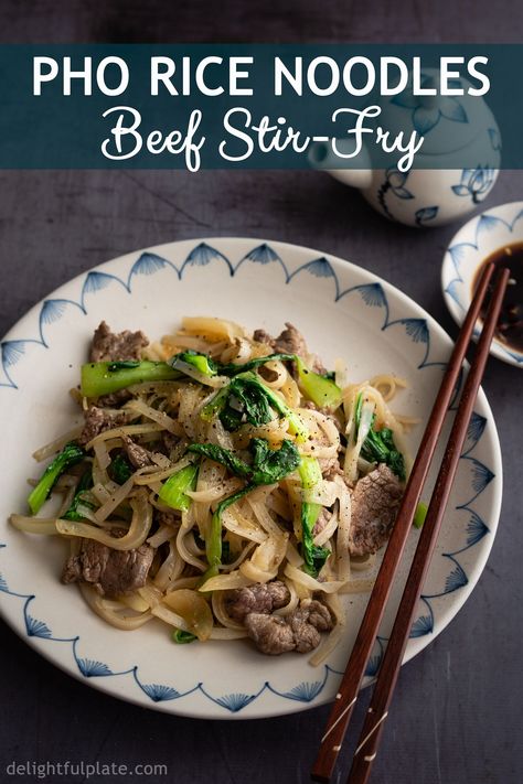 Vietnamese Stir Fry Pho Rice Noodles with Beef (Pho Xao Thit Bo) is a delicious dish with tender and flavorful beef, soft rice noodles and lots of vegetables. Everything comes together in just 15-20 minutes! An excellent quick and easy dish for weeknight dinner! #vietnamesepho #stirfry #beefrecipe Vietnamese Stir Fry, Stir Fry Rice Noodles, Easy Asian Noodle Recipes, Pho Beef, Easy Asian Noodles, Beef Noodle Stir Fry, Destination Holiday, Fry Rice, Rice Noodle Recipes