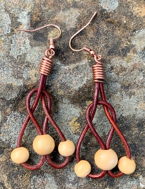 These lightweight fun earrings are approximately 2" long and 1" wide. Copper ear wires. Copper Components are Sealed with Protectaclear ProtectaClear is a clear, protective coating that is tough enough to protect jewelry and is safe for wear against skin. ProtectaClear is practically invisible once applied and will seal and protect jewelry from tarnish, oxidation, and corrosion Earrings With Leather Cord, Leather Earrings Ideas, Leather Cord Earrings, Jewelry Diy Ideas, Diy Lace Earrings, Wood Bead Earrings, Leather Cord Jewelry, Handmade Leather Jewelry, Diy Leather Earrings