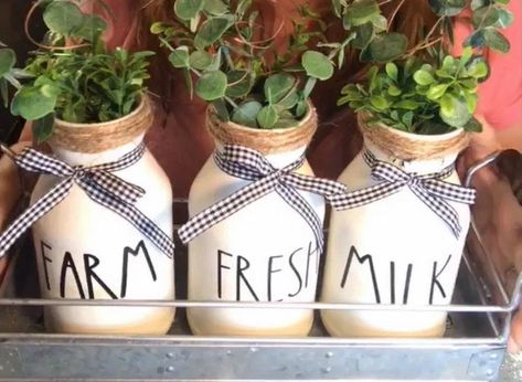 farmhouse milk jars kitchen decor DIY Pickle Jar Crafts, Milk Bottle Decor, Milk Bottle Diy, Milk Jars, Trendy Kitchen Decor, Frosted Glass Candle Holder, Old Milk Bottles, Dollar Tree Vases, Bottles Diy